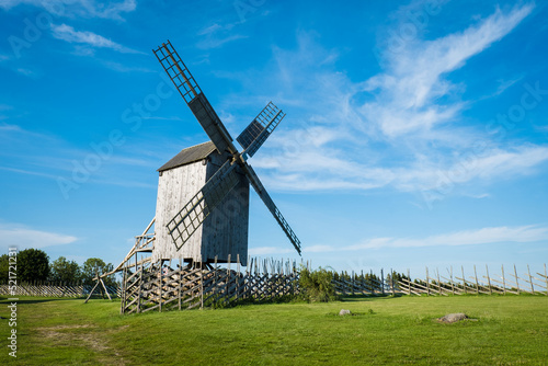 Typical wooden windmills of Estonian  countryside. Historical farm architecture. photo