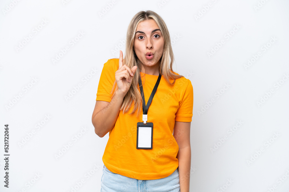 Young caucasian woman with ID card isolated on white background intending to realizes the solution while lifting a finger up Young caucasian woman with ID card isolated on white background intending to realizes the solution while lifting a finger up