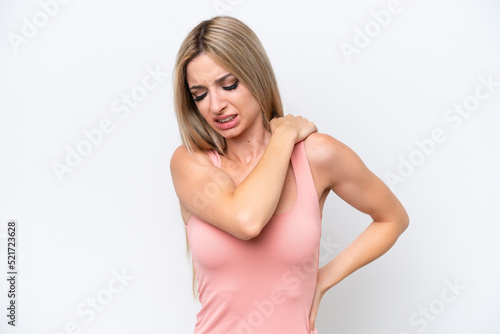 Pretty blonde woman isolated on white background suffering from pain in shoulder for having made an effort © luismolinero