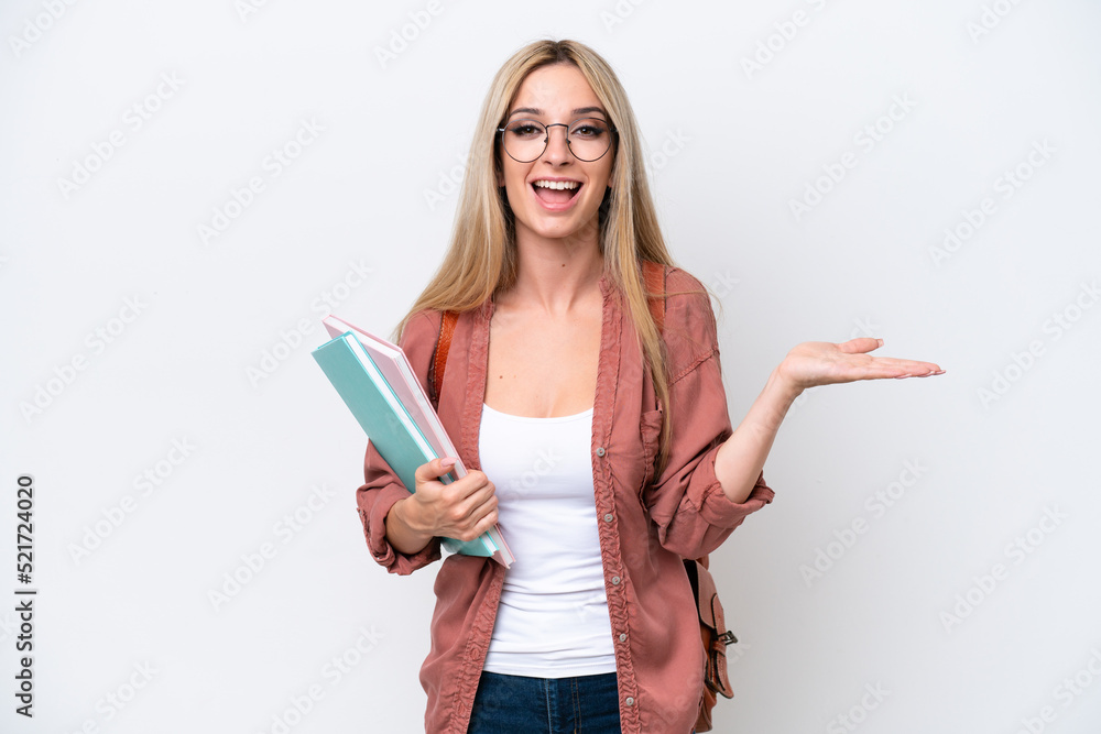 Pretty student blonde woman isolated on white background with shocked facial expression Pretty student blonde woman isolated on white background with shocked facial expression