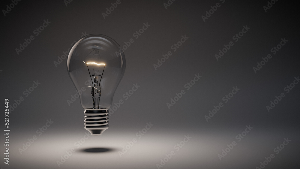 Glowing lightbulb on gray background Glowing lightbulb on gray background