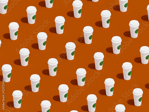 Seamless pattern of coffee cups on colored background photo