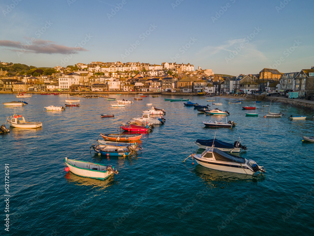 boats in the harbour at sunrise
