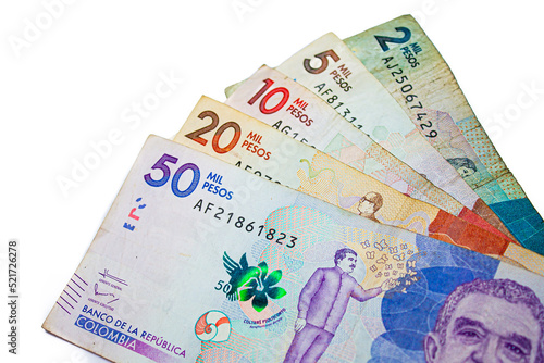 Colombian peso bills of 2000 5000 1000 2000 and 50000 pesos on white background, August 6, 2022
 photo