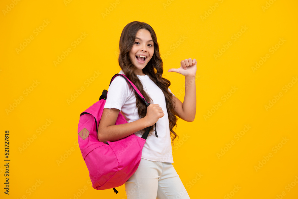 Back to school. Teenage school girl ready to learn. School children on yellow isolated background. Back to school. Teenage school girl ready to learn. School children on yellow isolated background.