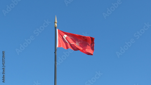 Turkish flag waving in the air a sunny day. Symbol of Turkey. Turkey national background.
