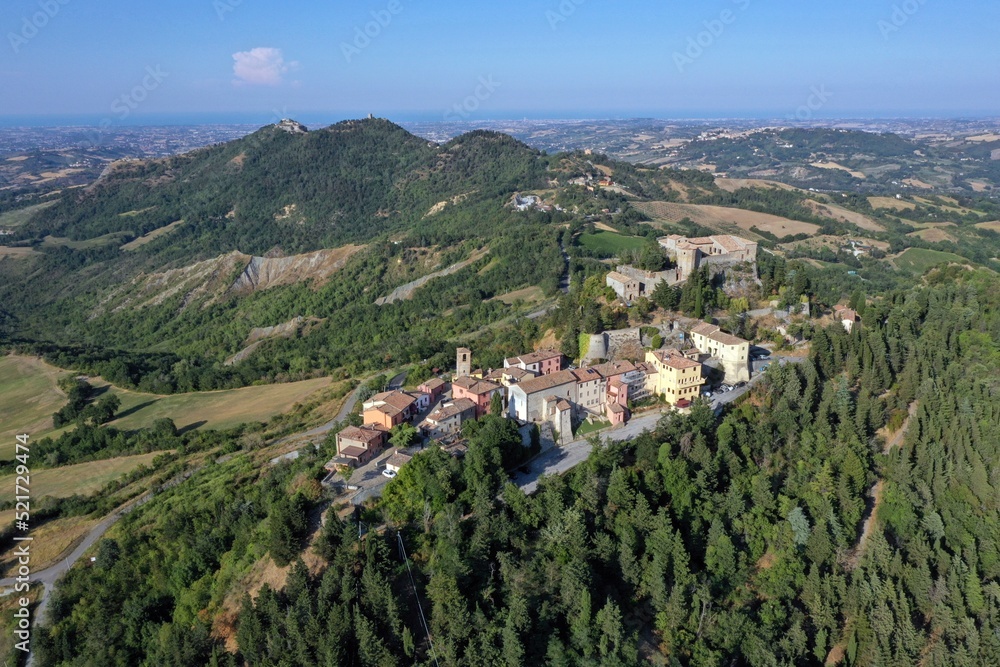 aerial view of Montebello village and his castle also named Azzurrina castle. Poggio Torriana, Emilia Romagna, Italy
