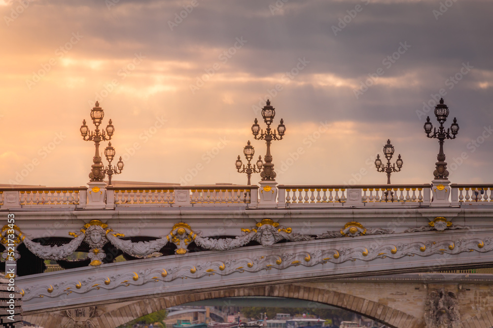 Obraz premium Line of Street light lamps in Pont Alexandre III, Paris, france