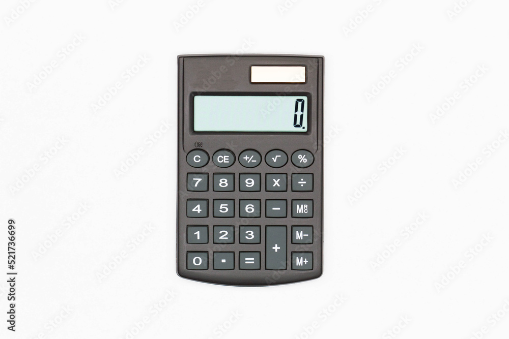 Calculator with big black buttons and zero on the digital screen on a white background. Solar powered calculator. Electronic machine for math calculations. Business office supplies. Isolated. Close-Up Calculator with big black buttons and zero on the digital screen on a white background. Solar powered calculator. Electronic machine for math calculations. Business office supplies. Isolated. Close-Up