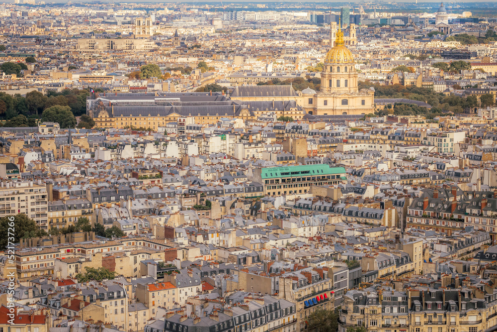 Les Invalides and parisian roofs at golden sunrise Paris, France