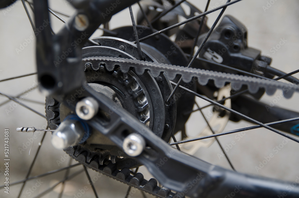 Fototapeta premium Black Internal gear hub with built-drive system for bicycle in close up.