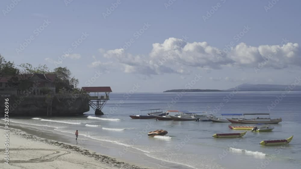 Tanjung Bira Beach Bulukumba, South Sulawesi, Indonesia - White Sand Tourists Boats Water Sports Tanjung Bira Beach Bulukumba, South Sulawesi, Indonesia - White Sand Tourists Boats Water Sports