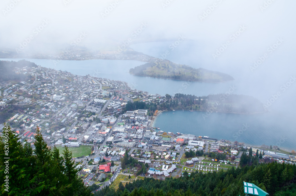 Aerial view of Queenstown, South Island, New Zealand in foggy day.