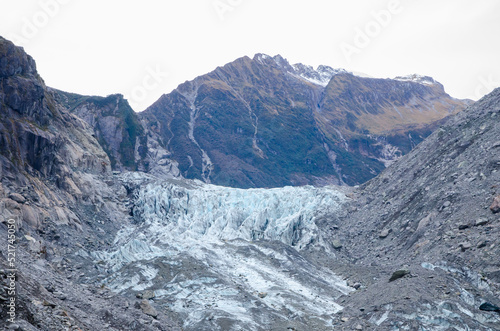 Fox Glacier / Te Moeka o Tuawe is a 13-milometer-long (8.1 mi) temperate maritime glacier located in Westland Tai Poutini National Park on the West Coast of New Zealand's South Island. photo