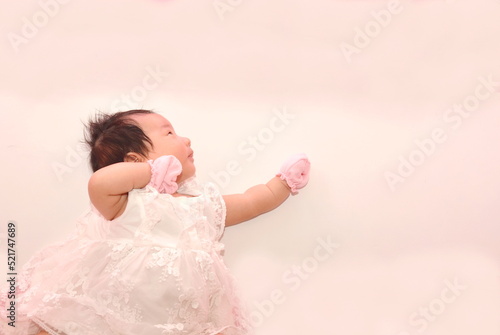 Baby looks at the blank space top view on white background
