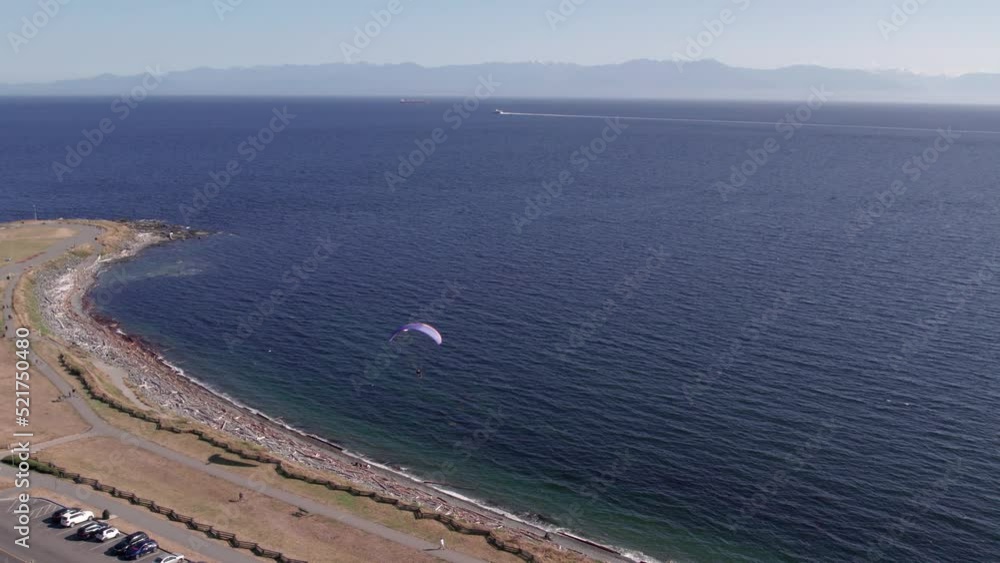 Paragliders beside the ocean, beautiful sunny day, aerial drone footage, soaring, coastline. 4K 24FPS Paragliders beside the ocean, beautiful sunny day, aerial drone footage, soaring, coastline. 4K 24FPS