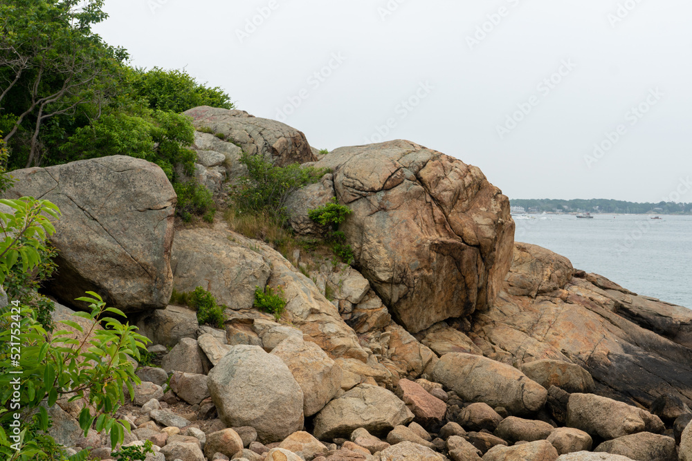 Beach Ocean and rocks on a cloudy overcast day in Gloucester, Massachusetts Beach Ocean and rocks on a cloudy overcast day in Gloucester, Massachusetts