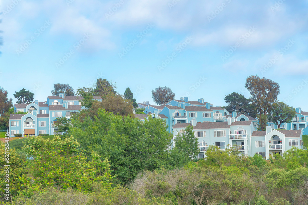 Townhouses with balconies and blue interior at Carlsbad, San Diego, California