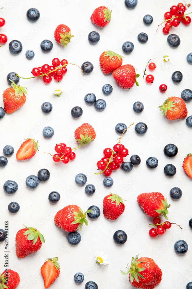 Various fresh berries on neutral background. Various fresh berries on neutral background.