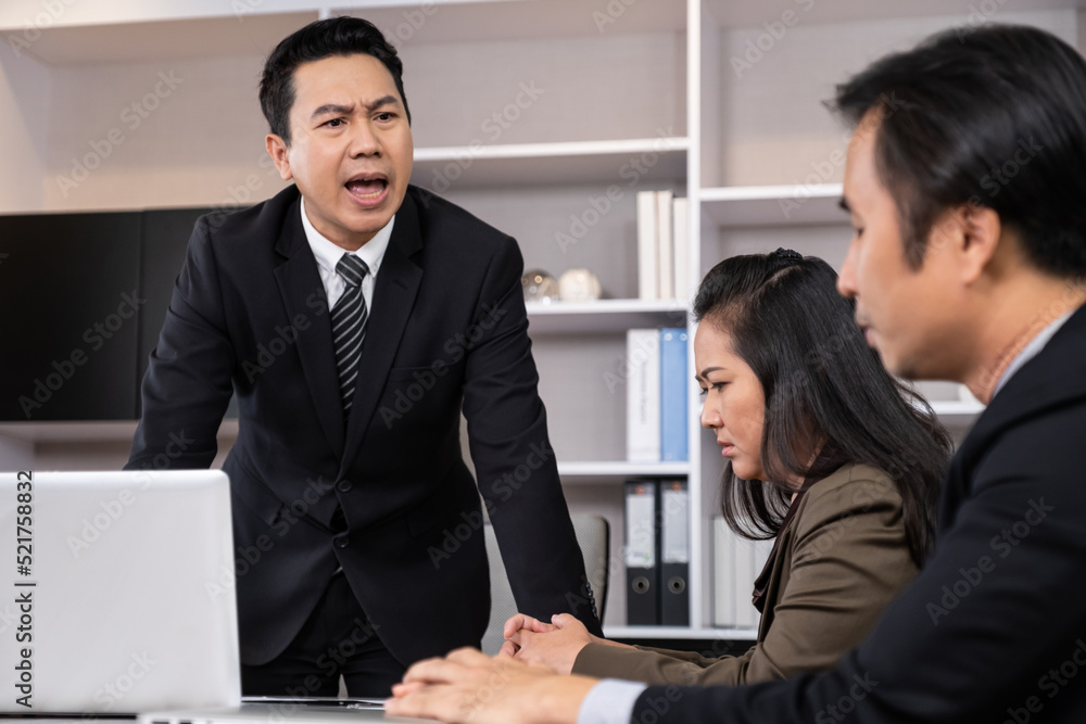 Asian men manager scold and angry with their employee inside of office meeting room with upset and stress worker. Business failure. Problem in working office, Negative emotion workplace. Asian men manager scold and angry with their employee inside of office meeting room with upset and stress worker. Business failure. Problem in working office, Negative emotion workplace.