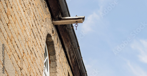 old hook on a building