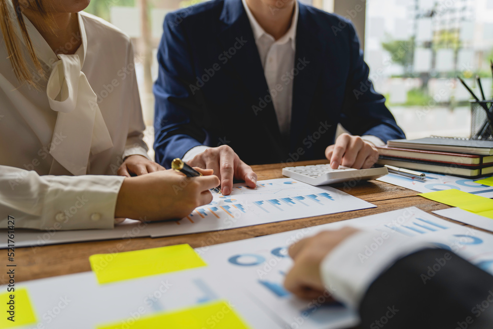 Teamwork with business people consultant describes a marketing plan to set business strategies. business budget planning and business research concept, Negotiation, Analysis, Discussion Teamwork with business people consultant describes a marketing plan to set business strategies. business budget planning and business research concept, Negotiation, Analysis, Discussion