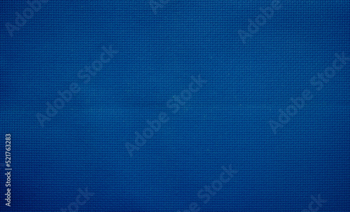 Closeup of blue fabric texture for background used. Pattern blue dark denim  linen  natural cotton satin textile textured.