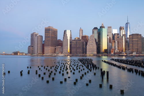 View of Manhattan skyline from Brooklyn Pier just before sunrise