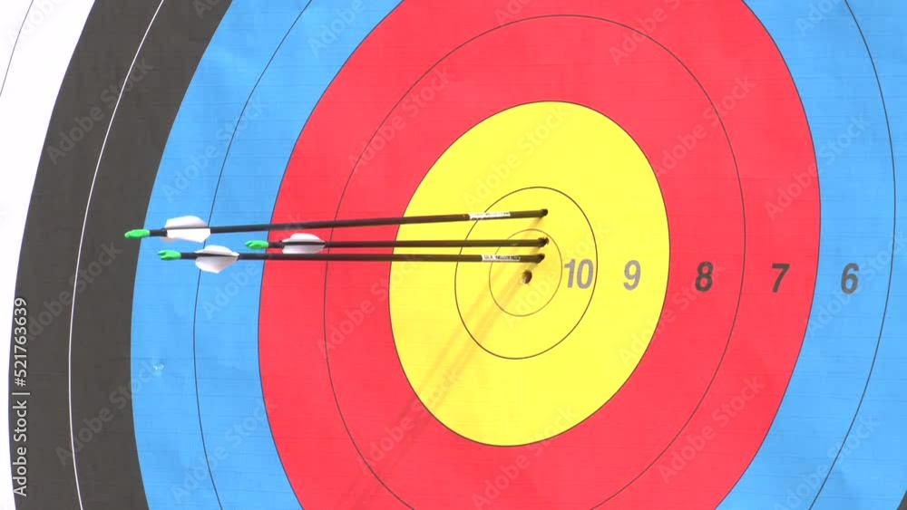 Successful concept, all gold arrows on target, archery sport. Arrow hit goal ring in archery target Successful concept, all gold arrows on target, archery sport. Arrow hit goal ring in archery target