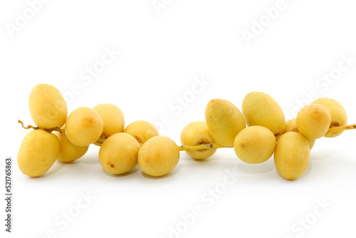 Bunch of fresh Date palm fruits isolated on white background.