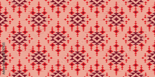 Ethnic abstract red pink. Seamless geometric pattern in tribal, folk embroidery, Aztec geometric art ornament print. Design for carpet, wallpaper, clothing, wrapping, fabric, cover.