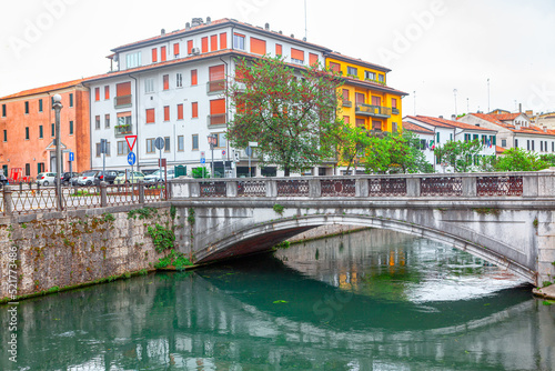 Bridge over river Sile in Treviso Italy . Arch bridge in Italian city