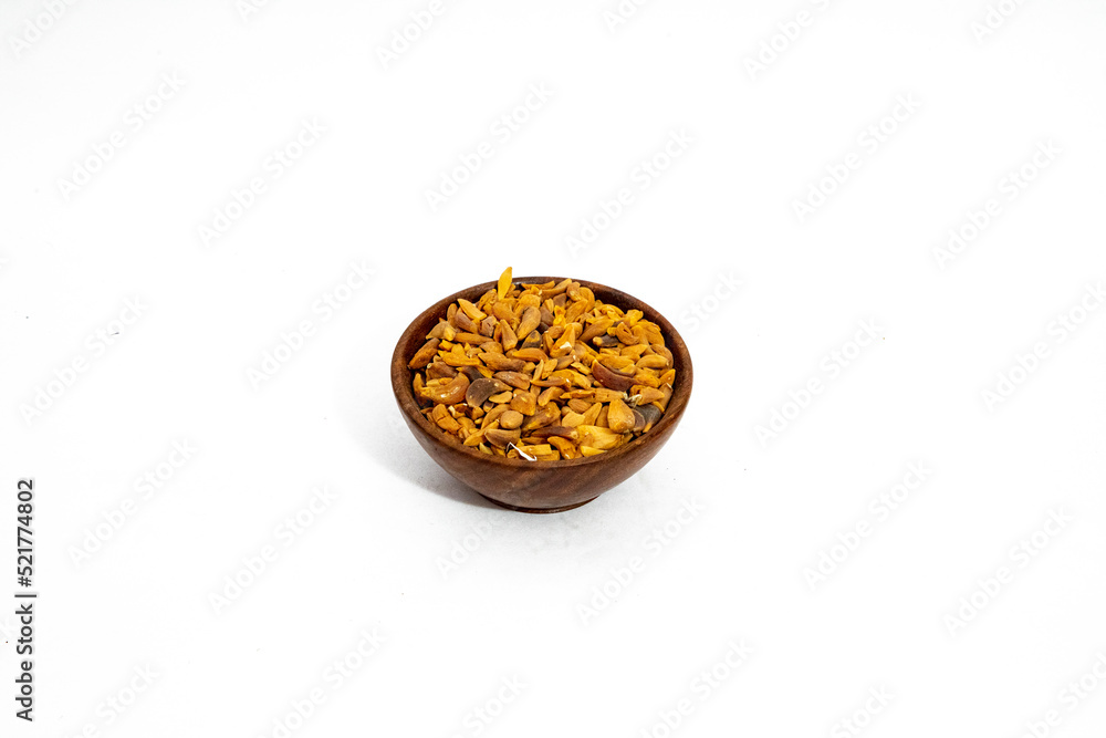 Dried garlic flakes or allium sativum isolated on white background