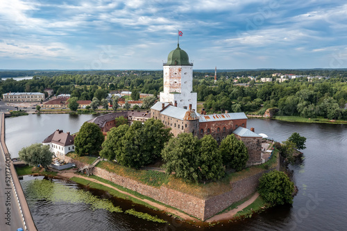 View of the castle on the island in the city of Vyborg in the afternoon in summer photo