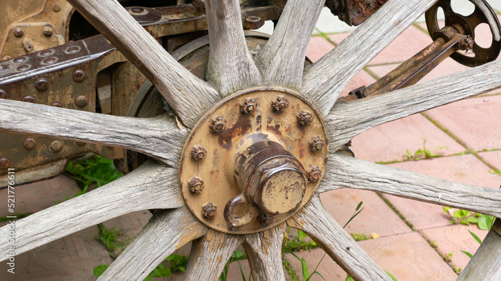 Wooden wheel of an old cannon in the city museum