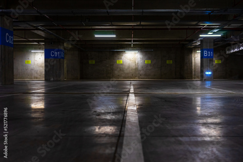 Empty parking lot. Underground parking garage © Vlad Ispas