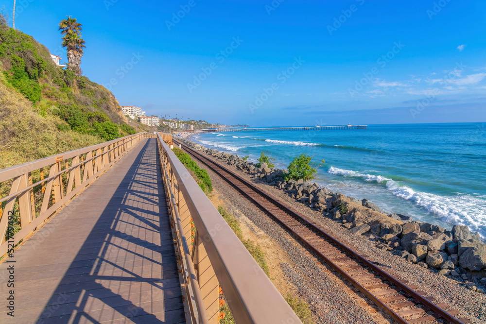 View of the train tracks and ocean from the bridge at San Clemente, California