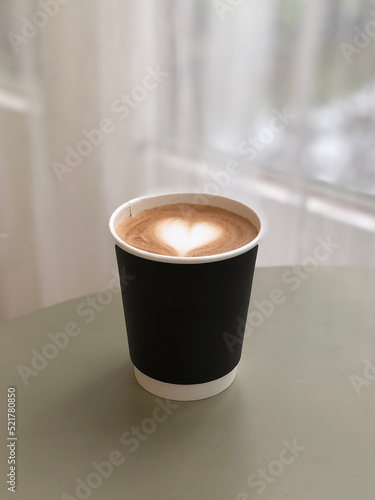 Heart latte art on coffee cup