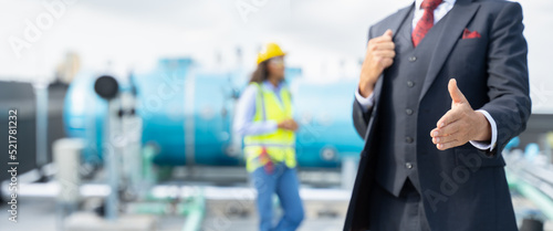 Engineer Male leader and Project manager stretch out his hand for handshake welcoming new employee invites newcomer to corporate team,group showing amity,human resources,boss greets clients concept