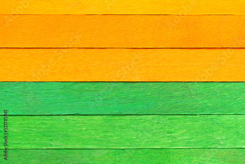 Wallpaper Mural Bright bicolor background from orange and green wooden planks. Wooden textured background with natural patterns. Green and orange painted wooden boards arranged horizontally in a row. Torontodigital.ca