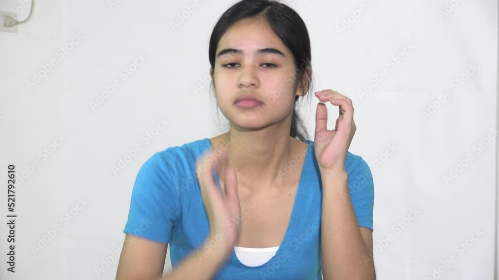 Pretty Female Asian Woman Preening Isolated Pretty Female Asian Woman Preening Isolated