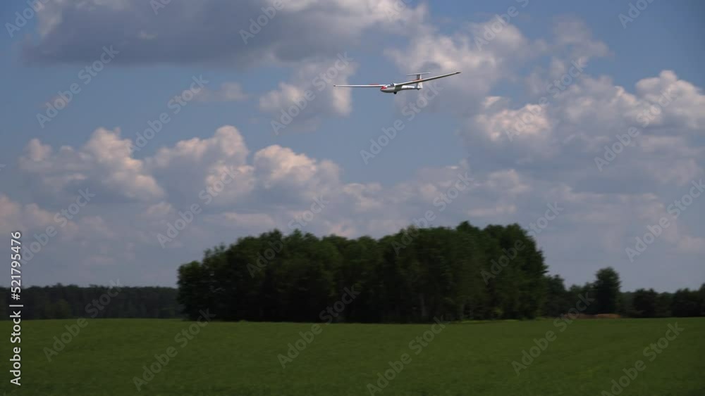 Landing of a glider among fields and meadows in Podlasie. Landing of a glider among fields and meadows in Podlasie.