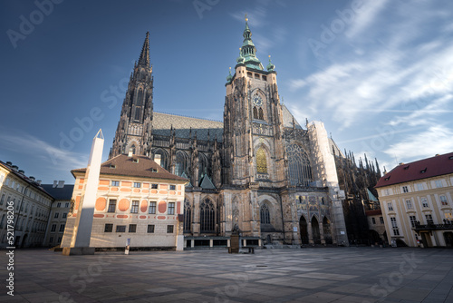 St. Vitus Cathedral at Prague Castle in Prague under moving clouds. Long exposure, Summer. No people.
