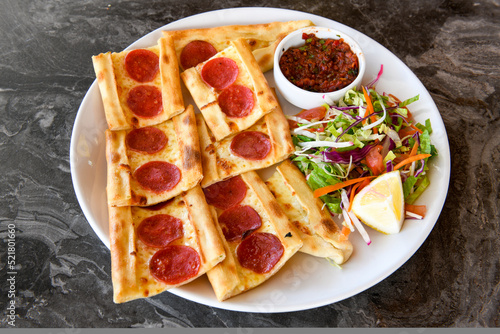 Kiymali pide. Turkish pide with minced meat. Turkish pizza mince pita Pide on white background. Etli ekmek. Kusbasi kasarli pide. photo