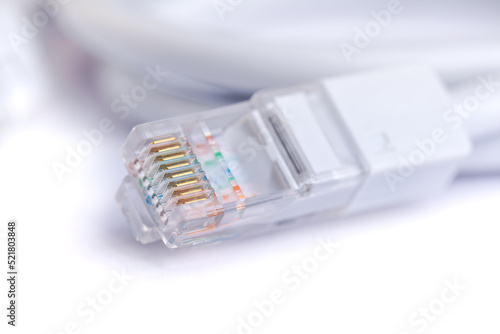 An image of computer network cable on white background photo