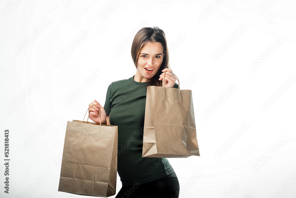 Attractive lifestyle isolated model. Young pretty lady with shopping bags. Attractive lifestyle isolated model. Young pretty lady with shopping bags.