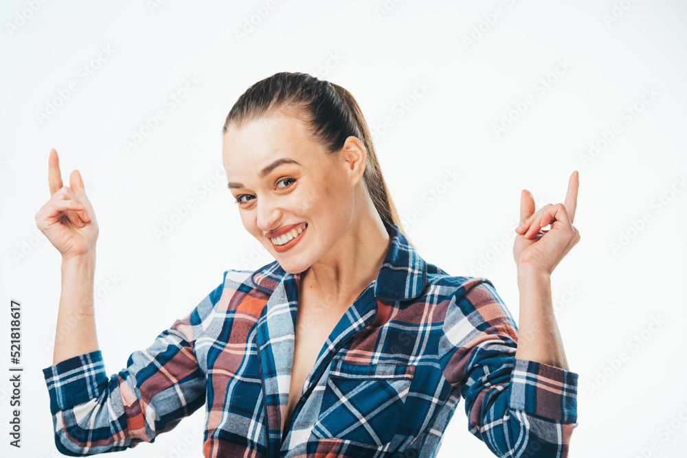 Happy attractive model showing expression. Amazed cheerful pretty lady dressed checkered shirt. Happy attractive model showing expression. Amazed cheerful pretty lady dressed checkered shirt.