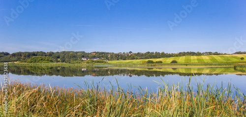 Obraz na plátně Panorama of a lake in the rolling landscape of Hobro
