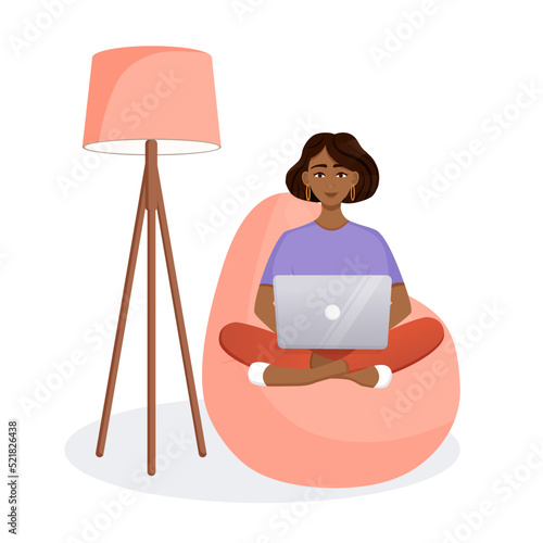 Woman sits on the bean bag chair and works at the computer. Remote work, office at home, programming, freelance. Study at home in quarantine. Vector illustration.
