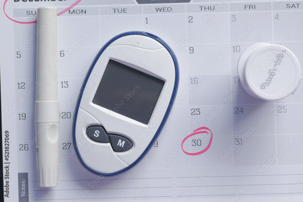 diabetic measurement tools on a calendar top view diabetic measurement tools on a calendar top view